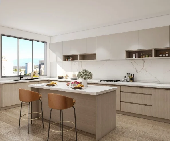 Spacious U-shaped kitchen featuring light wood cabinets, open shelving, and a central island with seating.