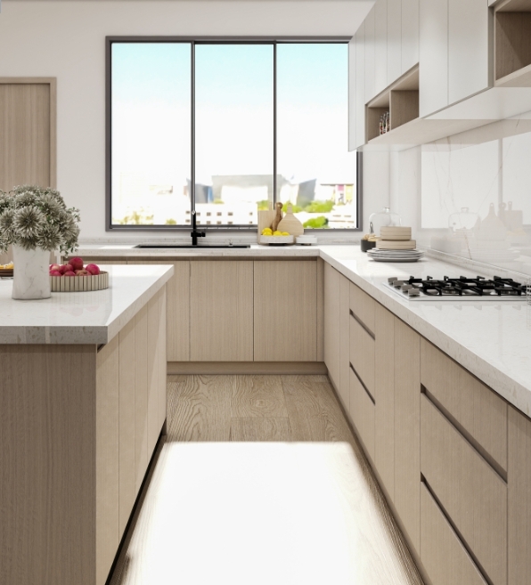 U-shaped kitchen with light wood cabinets, quartz countertops, and large windows for natural light.