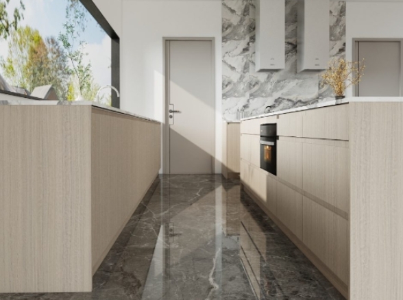 Modern galley kitchen featuring a marble backsplash, light wood cabinets, and a sleek, open design.