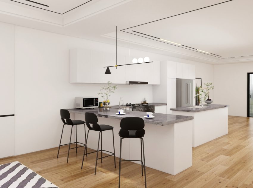 Modern kitchen design featuring a central island, breakfast bar with black stools, and sleek cabinetry with wood flooring.
