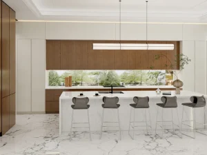 A modern L-shaped kitchen featuring a custom-made design with white marble countertops, sleek wood cabinetry, and elegant lighting fixtures