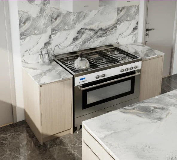 Modern cooking area with marble-finished countertops and light wood cabinets, featuring a stainless steel stove.