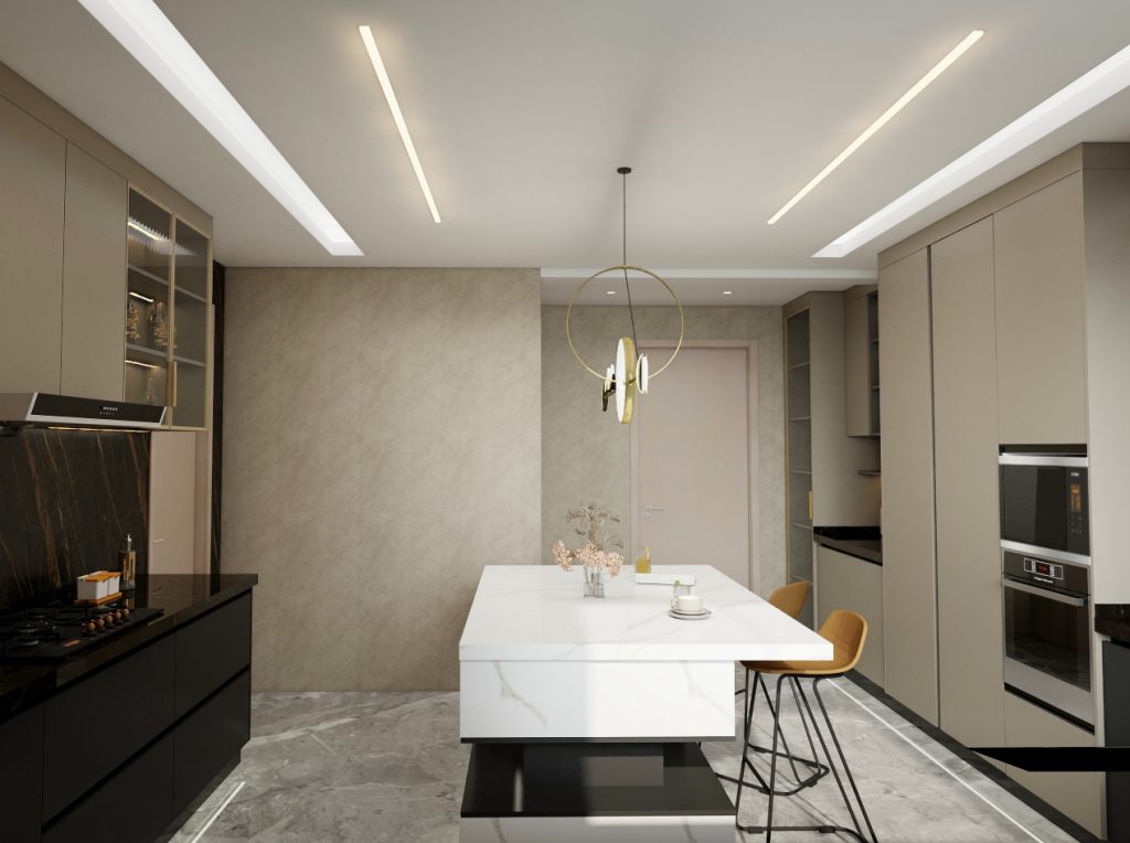 Minimalist modern kitchen with a marble island, sleek beige cabinetry, and stylish pendant lighting.