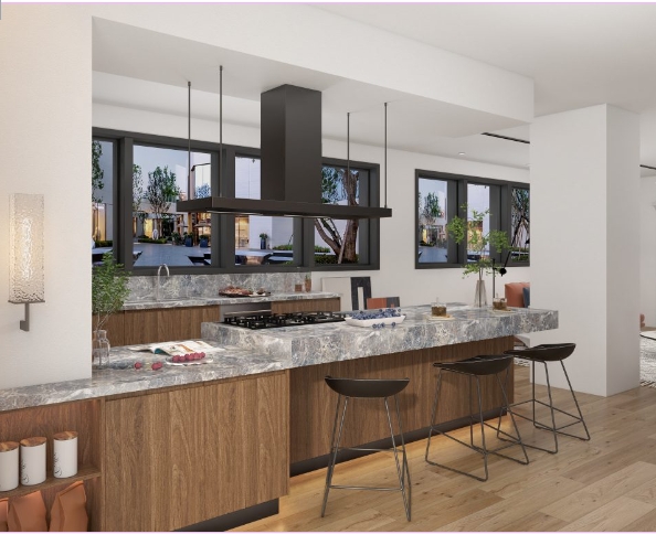 Contemporary kitchen featuring a marble island, warm wood cabinetry, and sleek black accents.