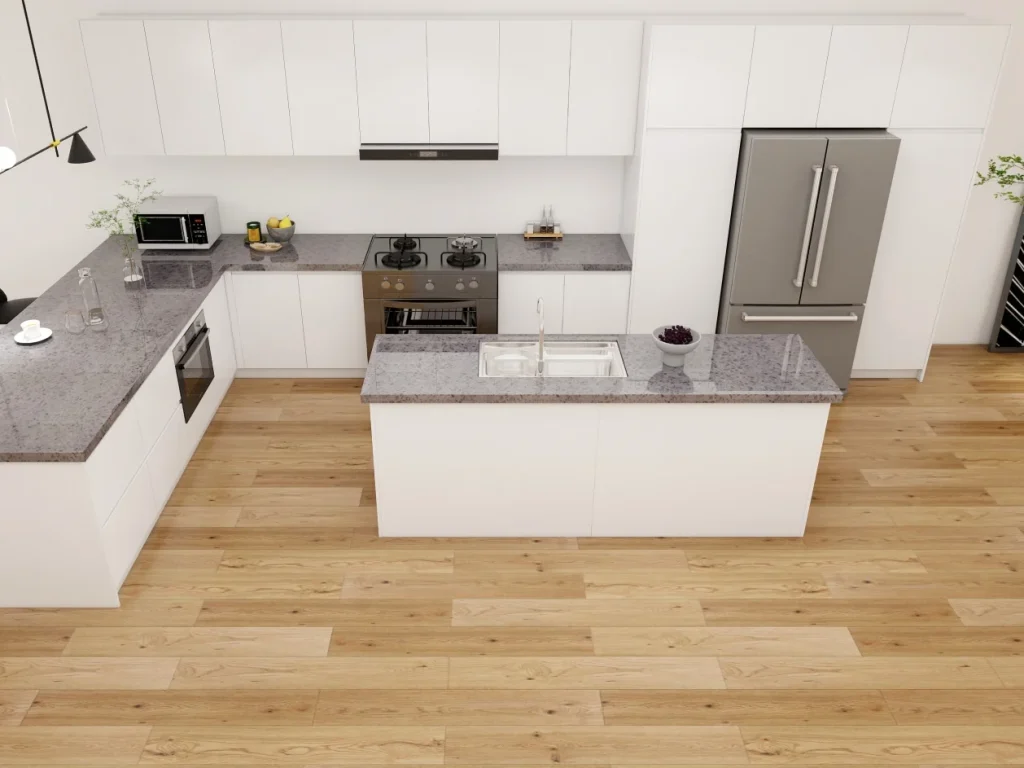 Modern kitchen featuring dual islands, streamlined white cabinetry, and natural wood flooring, perfect for an open and functional cooking space.