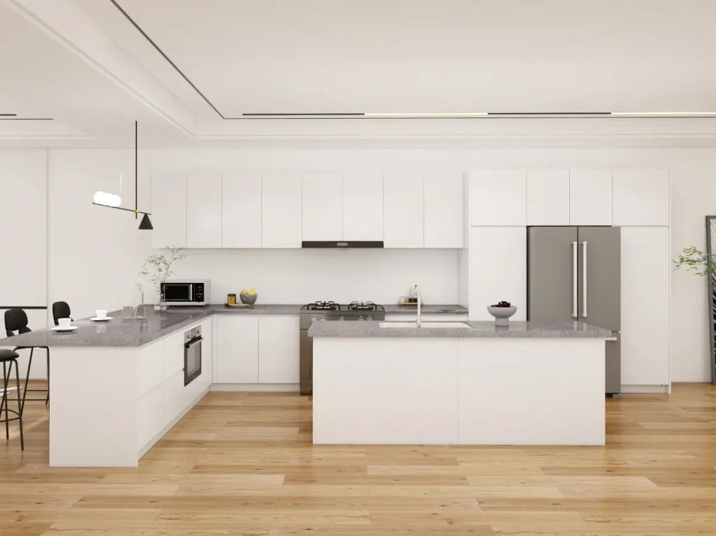Modern kitchen featuring dual islands, streamlined white cabinetry, and natural wood flooring, perfect for an open and functional cooking space.