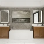 Luxurious bathroom featuring two walnut vanities with white countertops, set against a backdrop of marble walls and centered around a modern bathtub.