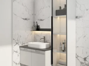 A floating bathroom vanity with white cabinets, a grey countertop, and glass display shelves, mounted against marble walls.