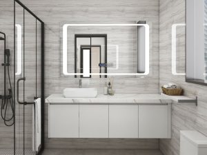 Modern white bathroom vanity with sleek lines and integrated lighting, paired with a large LED mirror and glass shower enclosure.