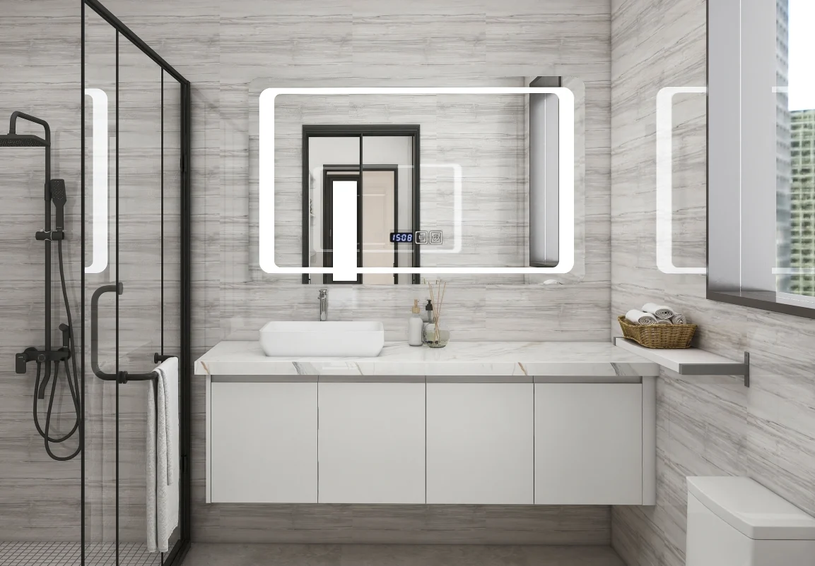 Modern white bathroom vanity with sleek lines and integrated lighting, paired with a large LED mirror and glass shower enclosure.
