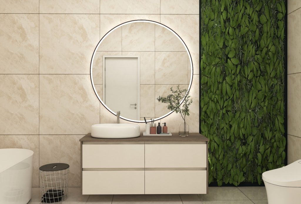 Modern bathroom vanity featuring a floating design with a circular LED mirror, earthy wood tones, and vibrant green plant wall.