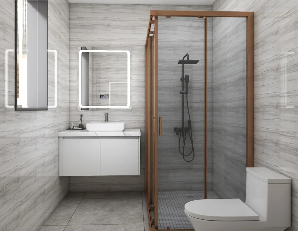 Small white bathroom vanity with a single sink, paired with a compact glass shower and bronze accents, creating a cozy yet modern space.