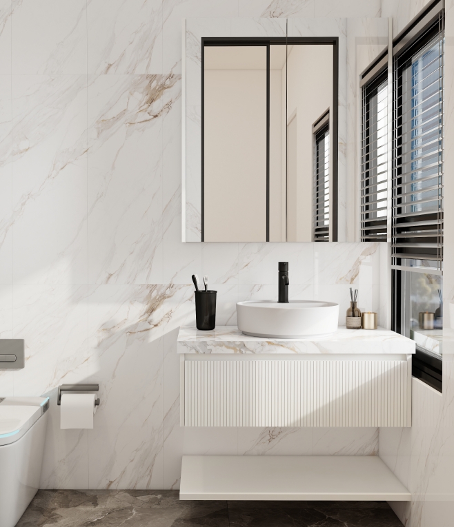 Modern white bathroom vanity with marble countertops and round sinks.