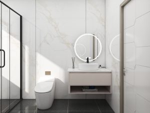 Minimalist bathroom vanity with a round illuminated mirror and light-toned drawer.