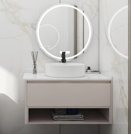Small bathroom vanity with an illuminated mirror and simple design.