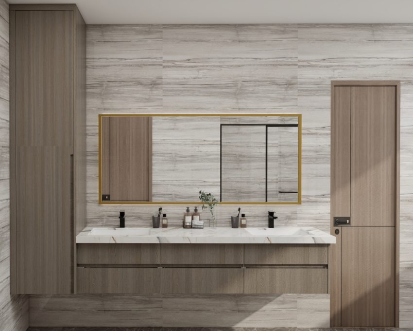Minimalist bathroom with wooden vanity and gold-framed mirror.
