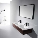Contemporary double sink vanity with black faucets and wooden base, featuring a sleek mirror