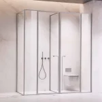 Sleek bathroom design featuring a glass shower enclosure and modern toilet