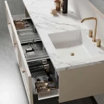 Stylish bathroom vanity with marble countertop and modern storage drawers showcasing sanitary ware