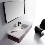 Stylish wall-mounted sink vanity with black faucet and minimalist design