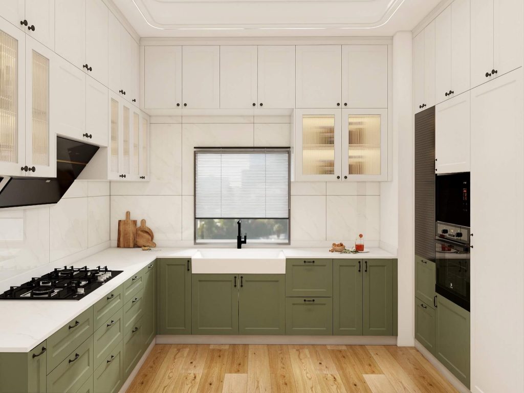 A kitchen featuring olive green cabinets paired with white marble countertops, creating a warm and earthy Mediterranean-inspired atmosphere.