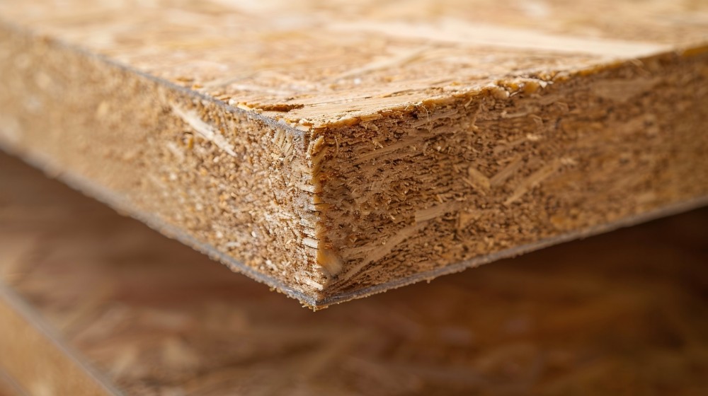 Close-up of PA Home particle board with high-density fiberboard core and professional melamine coating, featuring moisture-resistant properties.