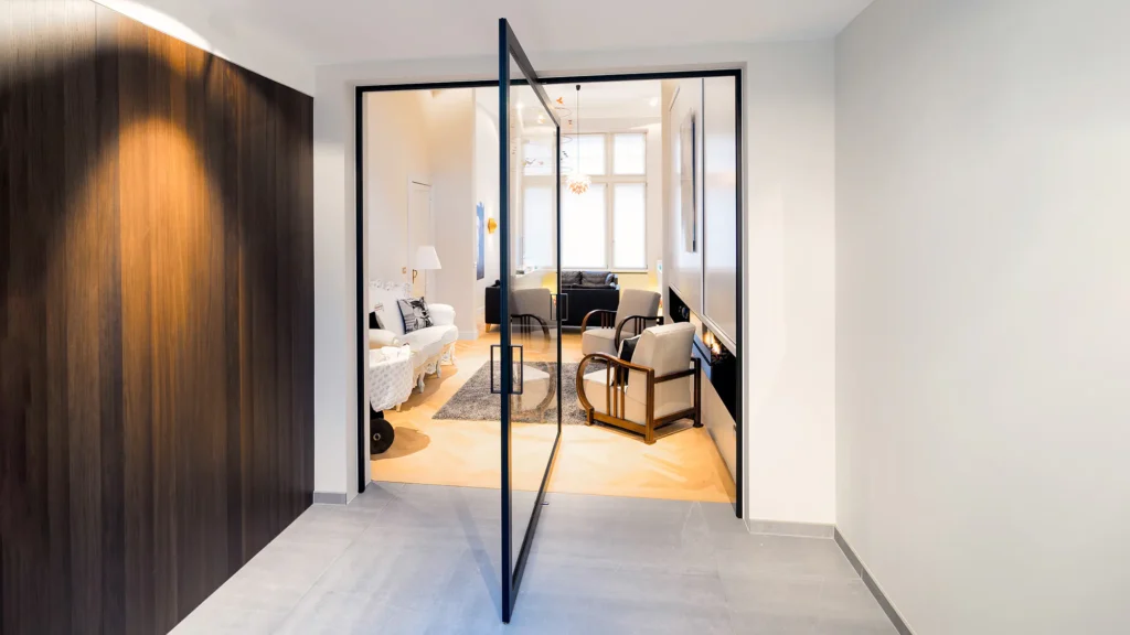 large glass pivoting door