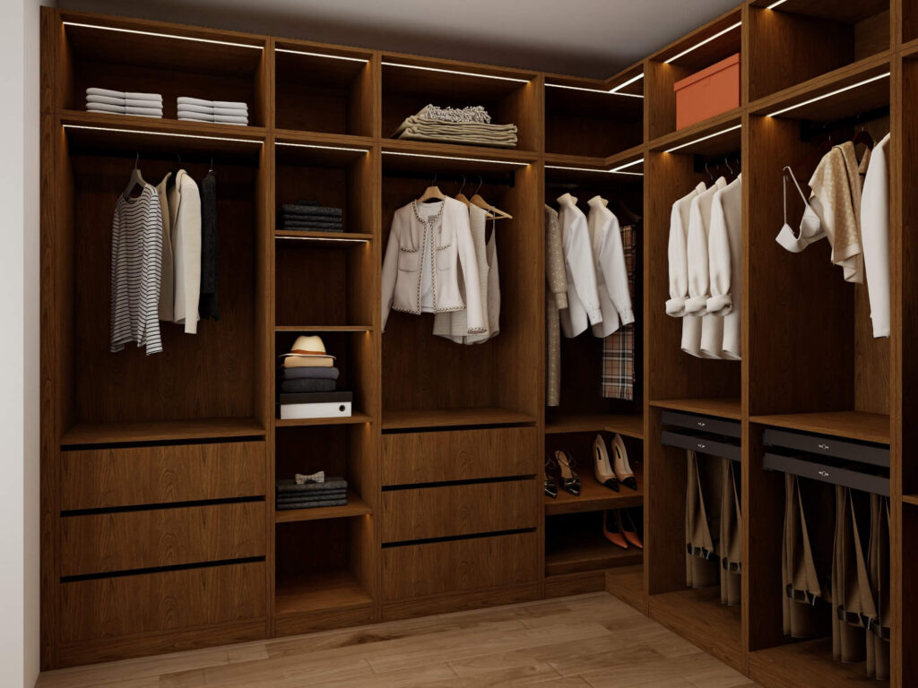 Walk-in closet featuring custom soft-close drawer system, hanging sections, and shelving for better storage organization.