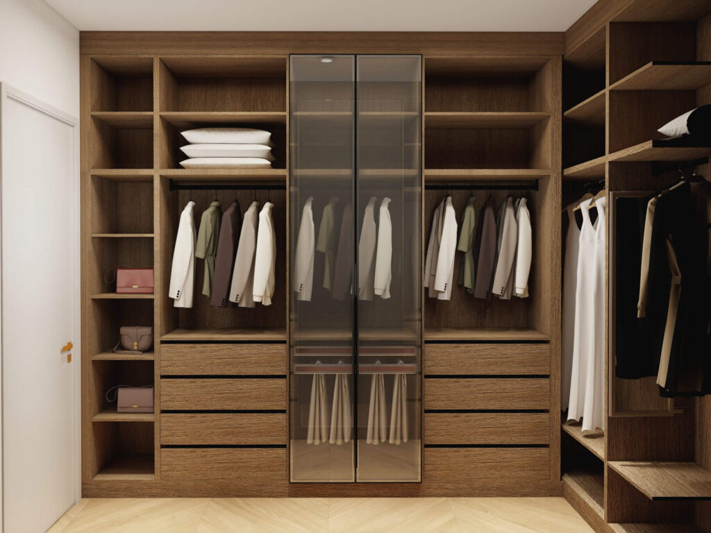 Walk-in closet with quality hardware featuring soft-closing doors and drawers for silent operation and smooth functionality.