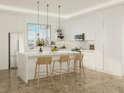 Airy Kitchen with Sleek White Cabinets and Spacious Island A bright, airy kitchen featuring sleek white cabinets and a spacious marble island, ideal for cooking and socializing.